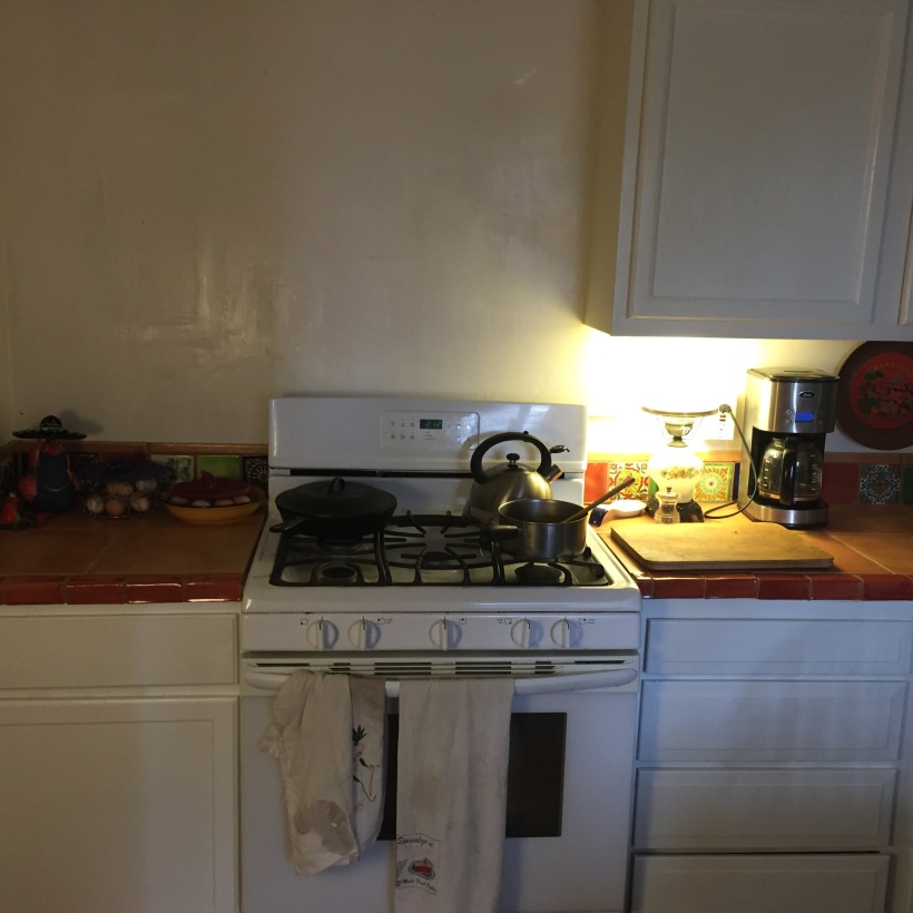 new cabinet to left of stove